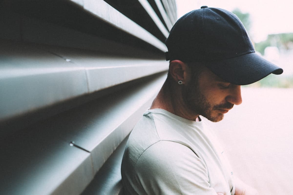 Man wearing the classic black baseball cap