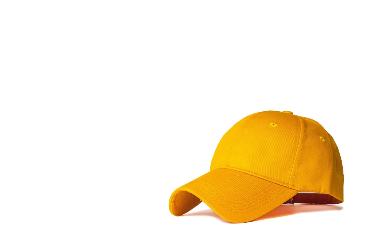 Mustard dad cap on white background