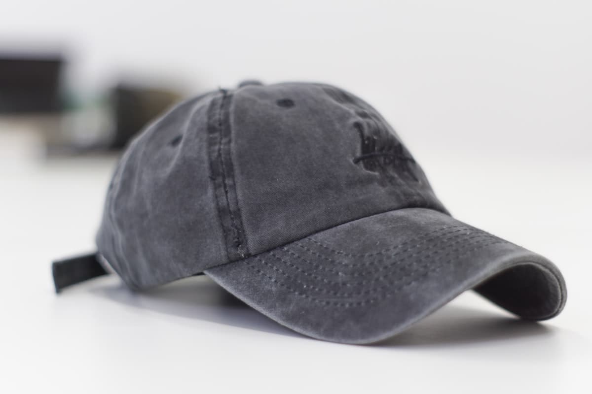 Washed grey dad cap product shot