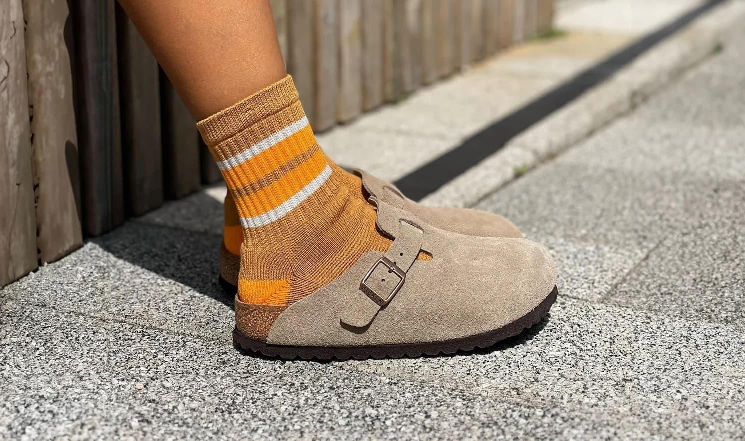 Mustard and cream striped crew sock worn with sandals